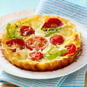 Tartelette met tomaat en mozzarella