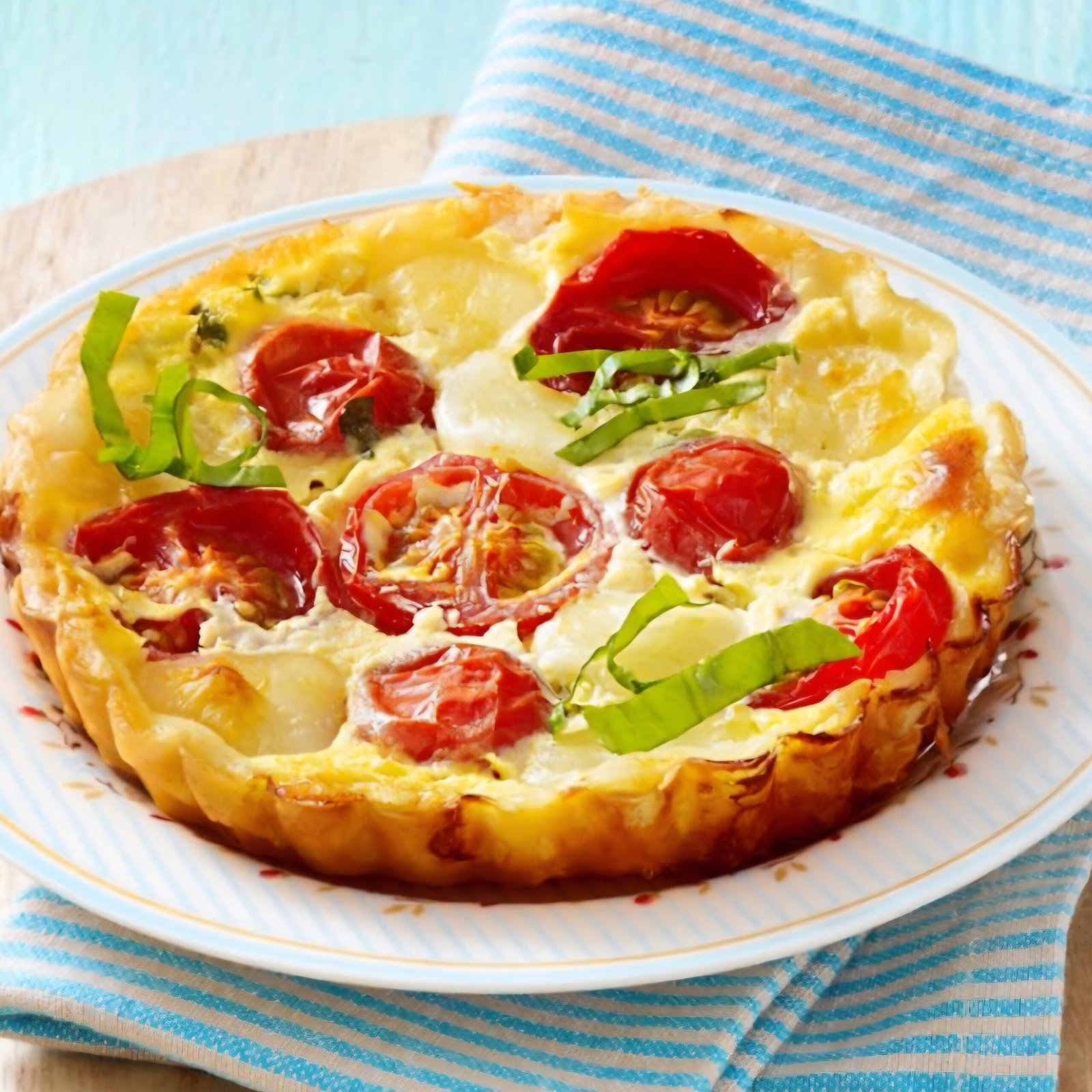 Tartelette met tomaat en mozzarella